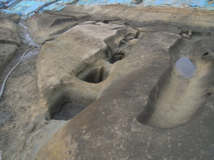 弥生時代前期の木製品水漬け遺構の完掘状況